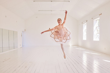 Image showing Ballet, passion and art performance with ballerina express freedom with classic, elegant move in a dance studio. Free female practicing a routine, jumping with high energy and perfect posture