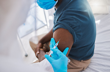 Image showing Vaccine, injection or medicine cure for covid, monkeypox and ebola with trust doctor, healthcare or medical worker. Physician in hazmat suit with wellness treatment for patient arm at hospital clinic