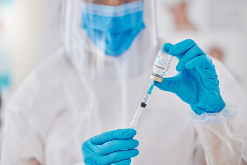 Image showing Covid vaccine, injection and medicine cure with needle, vial and syringe from a doctor in a hospital. Closeup of healthcare worker giving flu jab, antiviral shot and medical treatment for immunity