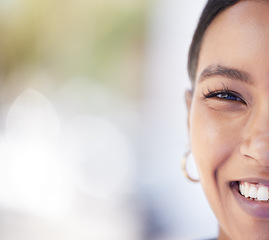 Image showing Half face portrait of a young woman with beautiful, smooth and clear skin with copy space. Closeup of a happy girl with glowing skin after a facial spa treatment for wellness, bodycare and skincare.