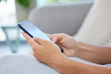 Image showing Social media, online shopping and surfing the internet, woman on a phone on a sofa. Communication, conversation or payment online on a sofa. Relax and chat or working in ecommerce with web technology