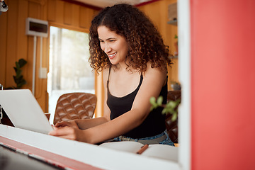 Image showing Freelance woman on a laptop working, planning and organizing ideas for social media marketing project, copywriting or website. Freelancer or entrepreneur reading email or doing seo research online