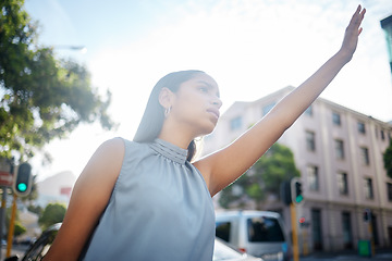 Image showing Travel with taxi, cab or uber in a city for business woman to commute to work, airport or hotel with transport. Young female worker stretching hand in town street, road or sidewalk for trip outside