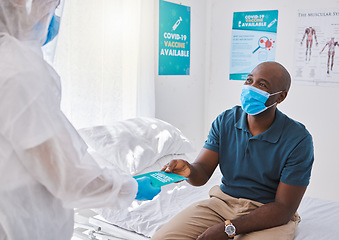 Image showing Medical doctor giving brochure to man with covid, wearing mask and getting healthcare wellness advice. Expert, professional or medicine worker consulting with patient and giving marketing insurance