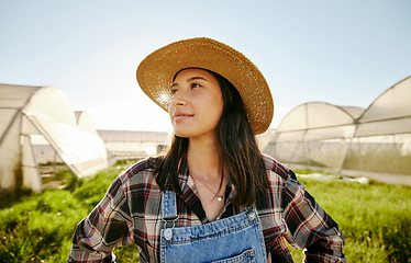 Image showing Greenhouse, plantation and woman farmer thinking in garden field. Farming with carbon capture positive environmental business. Eco friendly company and agriculture for production sustainability.