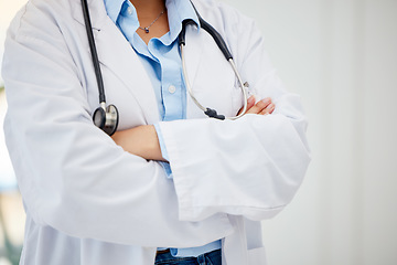 Image showing Medical healthcare doctor, woman worker or employee arms crossed standing confident with stethoscope in hospital. Leadership, work and wellness female staff manager nurse working in medicine office.