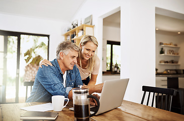 Image showing Couple with laptop planning finance, banking and checking retirement budget while becoming debt free at home. Smiling, happy and cheerful mature man showing woman an approved bank loan on technology