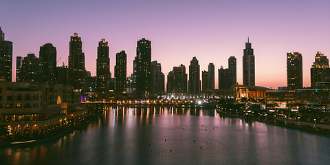 Image showing Unique view of Dubai Dancing Fountain show at night.