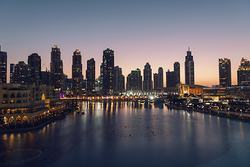 Image showing Unique view of Dubai Dancing Fountain show at night.