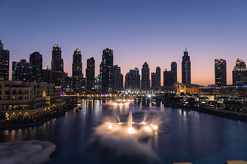 Image showing Unique view of Dubai Dancing Fountain show at night.