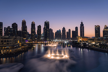 Image showing Unique view of Dubai Dancing Fountain show at night.