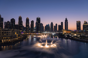 Image showing Unique view of Dubai Dancing Fountain show at night.