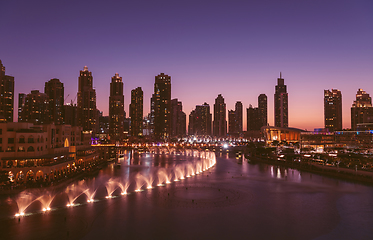 Image showing Unique view of Dubai Dancing Fountain show at night.