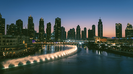 Image showing Unique view of Dubai Dancing Fountain show at night.