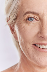 Image showing Beauty, skincare and senior face model showing wellness, health and youth in studio with white background. Portrait, natural and self care from happy elderly woman with a glowing and beautiful smile