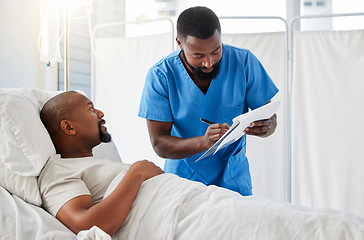 Image showing Healthcare, insurance and hospital planning by doctor and patient doing paperwork before surgery or during checkup. Help from a professional consulting with a sick man about a drug trial for cancer