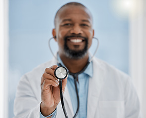 Image showing Medical, healthcare worker and doctor with a stethoscope and smile ready for a patient. Hospital, health clinic or professional doctors office worker happy to help check heart health of patients