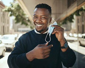 Image showing Post covid travel, working businessman with mask in city after lockdown restrictions and pandemic. African worker travel, closeup portrait employee smiling and change covid19 job safety regulations.