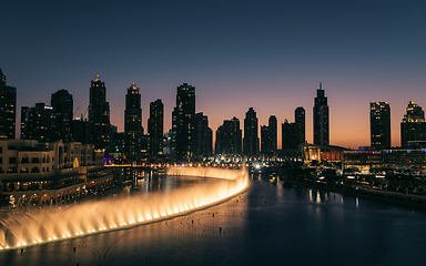 Image showing Unique view of Dubai Dancing Fountain show at night.