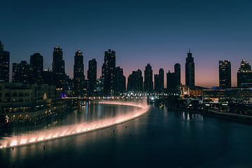 Image showing Unique view of Dubai Dancing Fountain show at night.