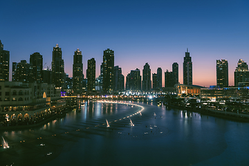 Image showing Unique view of Dubai Dancing Fountain show at night.