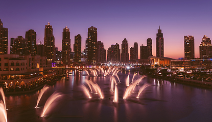 Image showing Unique view of Dubai Dancing Fountain show at night.