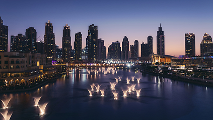 Image showing Unique view of Dubai Dancing Fountain show at night.