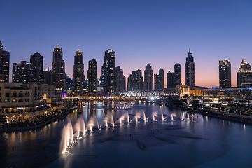 Image showing Unique view of Dubai Dancing Fountain show at night.