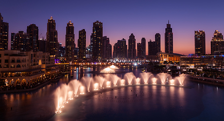 Image showing Unique view of Dubai Dancing Fountain show at night.