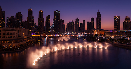 Image showing Unique view of Dubai Dancing Fountain show at night.