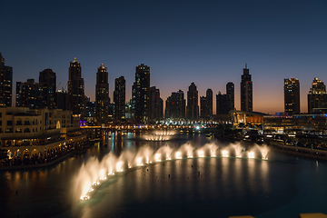 Image showing Unique view of Dubai Dancing Fountain show at night.