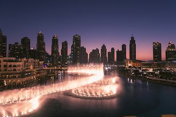 Image showing Unique view of Dubai Dancing Fountain show at night.