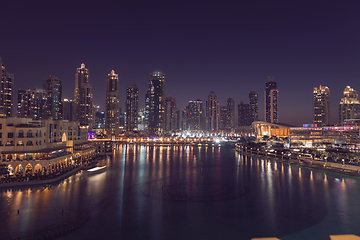 Image showing Unique view of Dubai Dancing Fountain show at night.