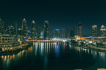 Image showing Unique view of Dubai Dancing Fountain show at night.