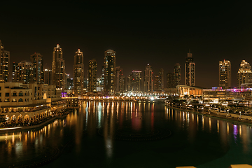 Image showing Unique view of Dubai Dancing Fountain show at night.