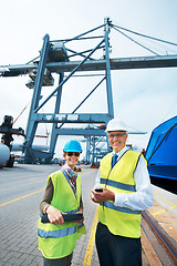 Image showing Industry workers working on a shipping dock to export stock packages, boxes or containers. Portrait of industrial, business and shipment employees at a cargo logistics outdoor warehouse with a crane.