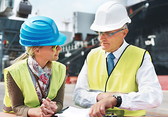 Image showing Dock worker, shipping and cargo delivery industry workers in safety gear working on logistics papers of the transportation. Supply chain, administration and managers in collaboration and conversation