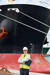 Image showing Shipping logistics, delivery and boat engineer with motivation, innovation or vision for ocean or sea cargo port. Mechanic technician portrait with folder idea for import and export supply chain dock