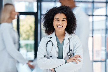 Image showing Portrait of happy doctor with smile in a hospital ward with motivation and success in the medical industry. African american healthcare expert or worker proud and confident in help make a difference