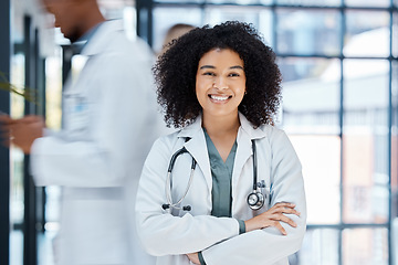 Image showing Woman, doctor and contact us for a healthcare medical test, insurance or help for professional services. Happy, smile and woman in a busy emergency hospital office offering expert health treatment