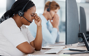 Image showing Burnout, stress and headache telemarketing employee working customer support for sales, consulting or call center company. Contact us, help desk and customer service worker in office by computer