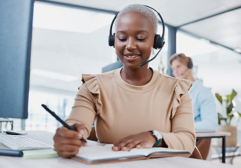 Image showing CRM, notebook and planning telemarketing consultant woman writing strategy, solution or idea with smile of success or motivation. Call center agent at desk for support, consulting and contact us