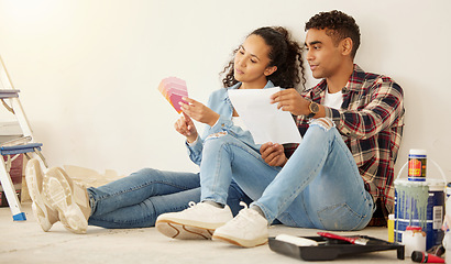 Image showing Painting, building or renovation with a couple in a home and talking about a color pallet for a DIY project in a house. Young man and woman in conversation about an idea while busy with an addition