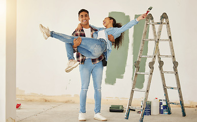 Image showing Diy, home improvement and wall painting with happy couple renovating house and having fun together. Playful husband and wife being silly and goofy, enjoying their relationship and project together