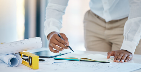 Image showing Architect, writing and planning with a business man drawing in a notebook with a blueprint and plan on a table in his office. Construction, engineer and architecture with a creative design at work