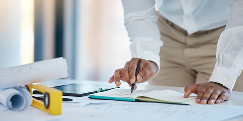 Image showing Architect hands drawing architecture sketch design with blueprint, floor plan engineering paper and notebook planning in a studio. Business industry worker working on a project company development