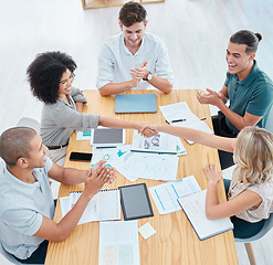 Image showing Teamwork, handshake and applause with a team in collaboration and celebration of success in a meeting. Trust, support and wow in the planning of strategy, vision and mission for future growth