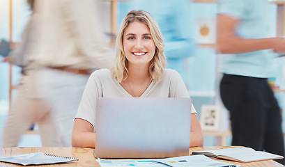 Image showing Student doing research on the internet with a laptop at a university class in a building. Portrait of creative woman working or studying for a project with paper and computer in busy library.