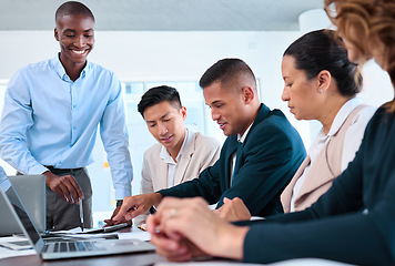 Image showing Happy business people launch ecommerce website on laptop with ux or ui team, graphic designer and marketing manager. Diversity workers in business meeting excited for company digital app development