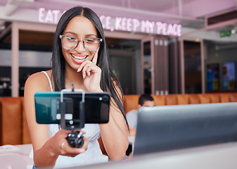 Image showing Social media influencer and phone with a woman recording content and live streaming subscription service for subscribers. Podcast, blog and video upload with a young female creator at a coffee shop